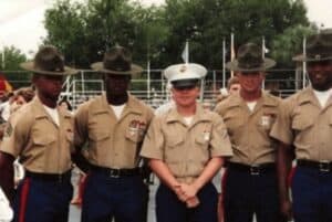 a group of uniformed men standing next to each other.
